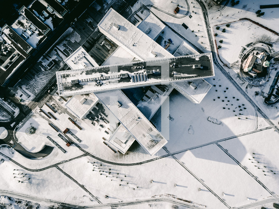aerial view over a city covered in snow 