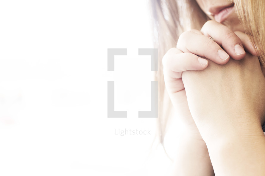 close up of praying hands 