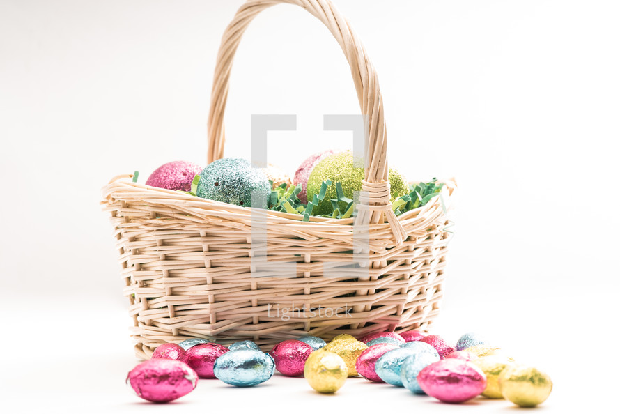 Easter eggs in a basket and Easter candy 