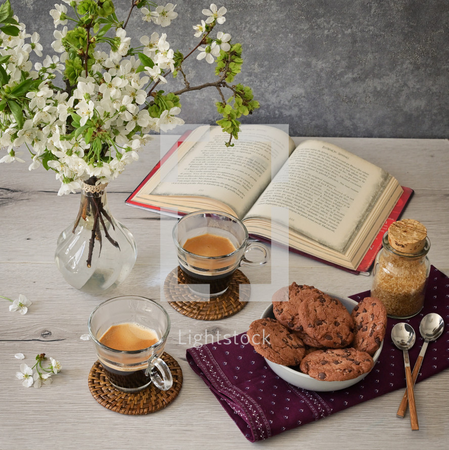 Spring table with Espresso cups and Chocolate Cookies