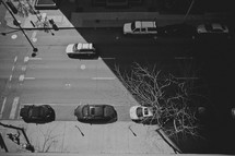 rooftop view of cars on a street
