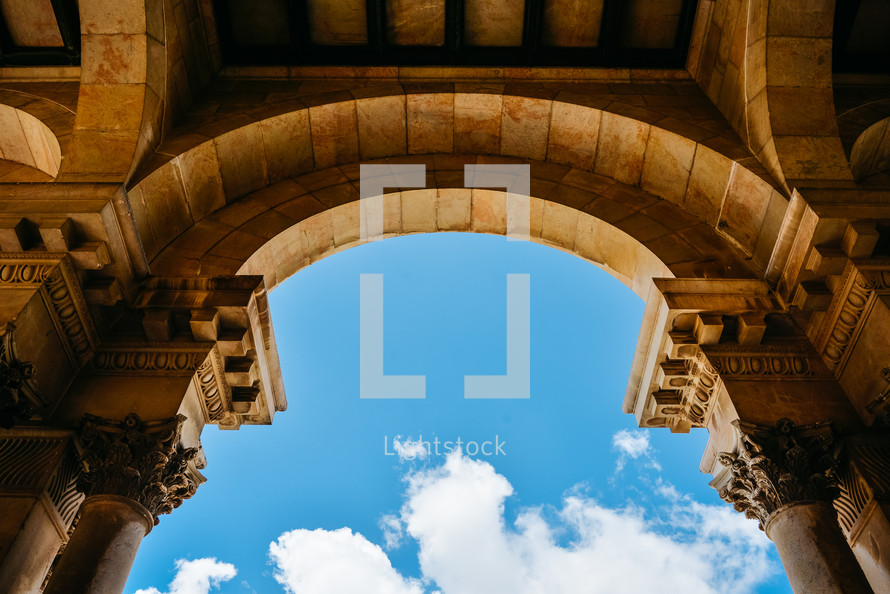 blue sky through an arched ceiling 
