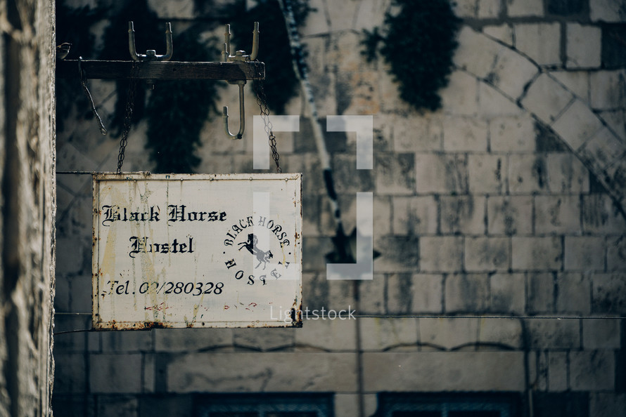 Black horse hostel sign 
