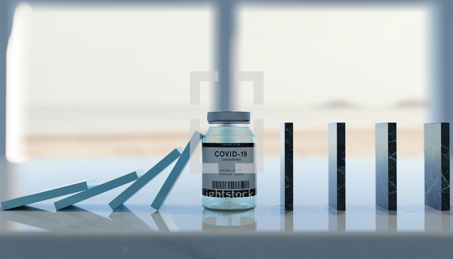 Biology and science. Covid-19. Concept of vaccination against Coronavirus Covid-19 glass bottle or glass container. Stopping domino effect concept