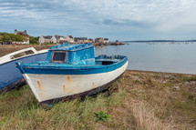 washed up beached boat 