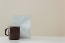 mug and tea packet 