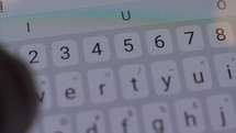Close up of a man texting about a church meeting