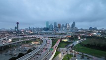 Dallas, Texas Skyline on a cloudy & gloomy morning with traffic.