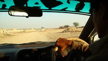 driving through a bumpy desert road 