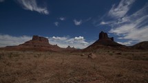 Tracking timelapse of clouds over beautiful buttes in the Utah landscape