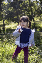 Little girl with an apple
