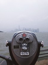 viewfinder across a bay facing towards a city 