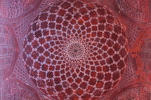 red and white radiating detail at the top of a dome 