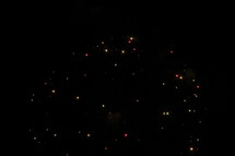 bursting fireworks in a night sky