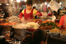 woman cooking in a restaurant 