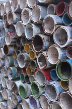 stacked empty paint cans 