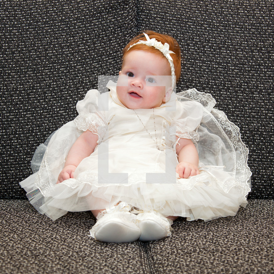 baby girl in a Christening gown 