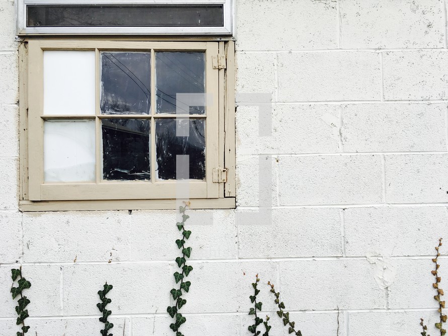 window on a concrete block wall 