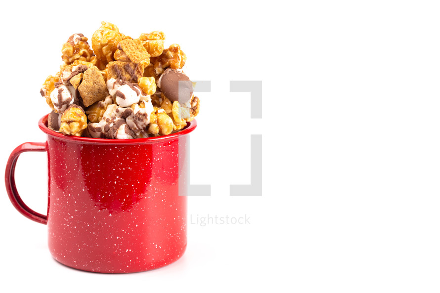 Smore Flavored Popcorn in a Red Camping Mug