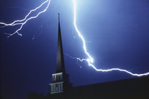 lightning bolt over a church steeple 