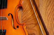 violin on a wood background