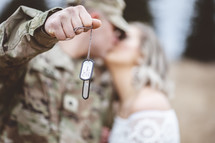 military couple kissing 