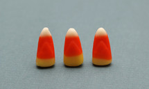 candy corn on a gray background 