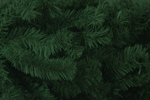 branches of an artificial Christmas tree 