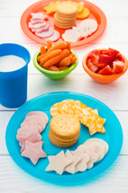 Healthy snack for Children on Bright Plates
