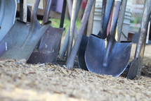 shovels in soil 