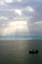 Fishermen at sunrise on the Sea of Galilee