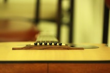 Guitar bridge and strings