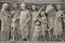 Ancient Roman carvings showing a city scene 