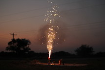 shooting off ground fireworks 