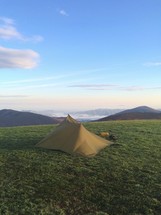 a tent on a mountain top 