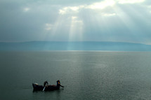 Fishermen on the Sea of Galilee in Israel at sunrise