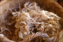 Basket of lamb's wool.
