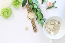 gold glitter dots, bowl, watch, leaves, twig, rose, feminine, white background 