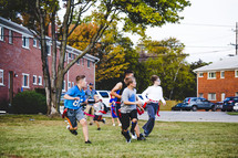 boys playing flag football 