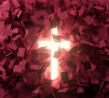 A glowing cross surrounded by hundreds of red Valentines cards