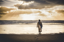 Jesus walking along a shore