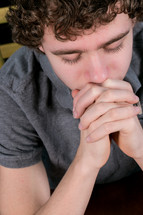Teen praying.