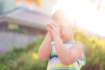 praying toddler boy 