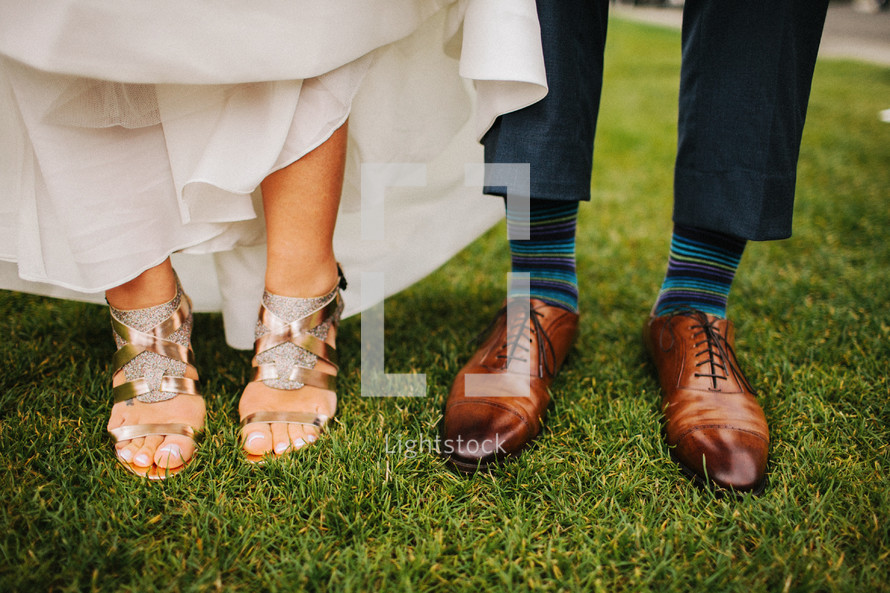 bride and grooms shoes and feet
