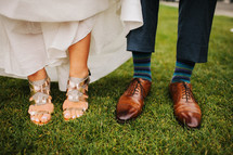 bride and grooms shoes and feet