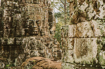 carvings in stone in a temple in Cambodia 