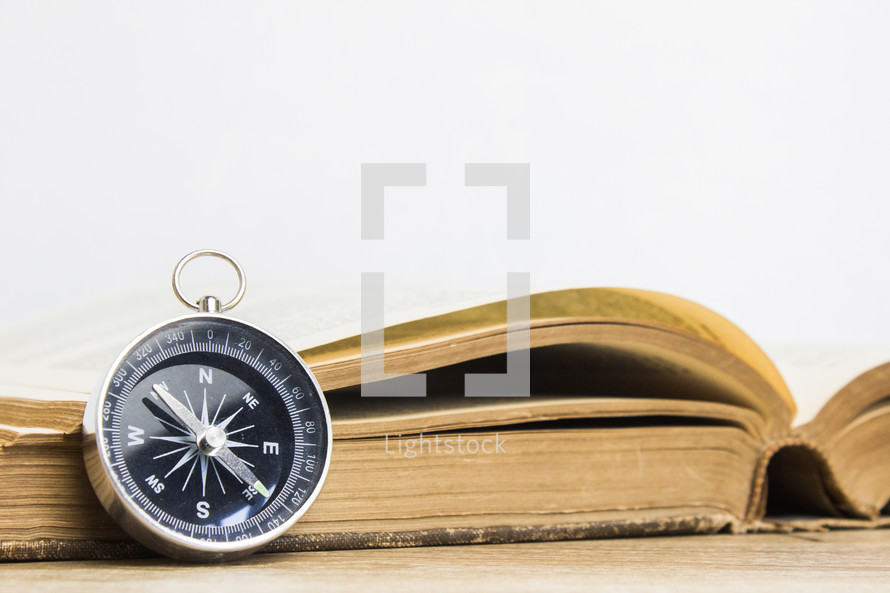 open book and compass 