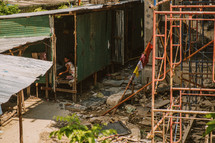 The poor living in shanties in Thailand. 