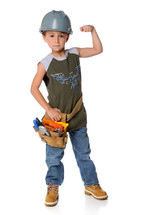 A boy wearing a tool belt and hard hat flexing his muscles.