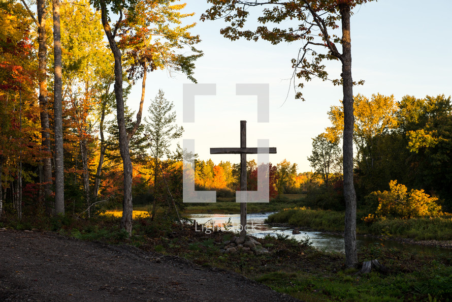 fall forest, river, and cross